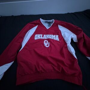 Red and white starter Oklahoma Sooners jacket